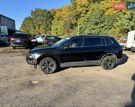 Черный Фольксваген Тигуан, объемом двигателя 2 л и пробегом 133 тыс. км за 11900 $, фото 13 на Automoto.ua