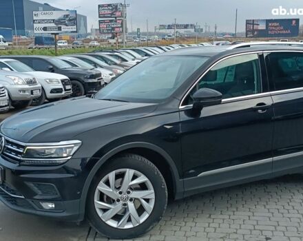 Черный Фольксваген Тигуан, объемом двигателя 2 л и пробегом 190 тыс. км за 23200 $, фото 1 на Automoto.ua