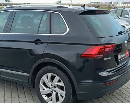 Черный Фольксваген Тигуан, объемом двигателя 2 л и пробегом 190 тыс. км за 23200 $, фото 4 на Automoto.ua