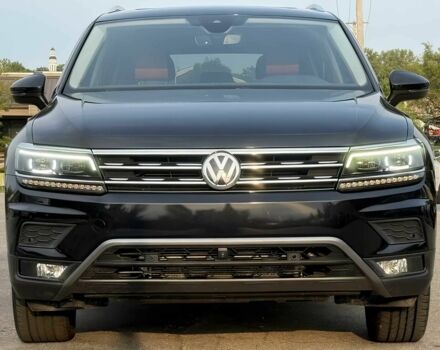 Чорний Фольксваген Тігуан, об'ємом двигуна 2 л та пробігом 34 тис. км за 11300 $, фото 1 на Automoto.ua