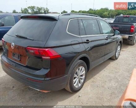 Чорний Фольксваген Тігуан, об'ємом двигуна 2 л та пробігом 187 тис. км за 16000 $, фото 2 на Automoto.ua