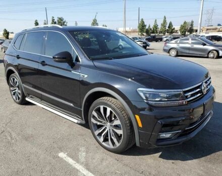 Чорний Фольксваген Тігуан, об'ємом двигуна 2 л та пробігом 65 тис. км за 6800 $, фото 3 на Automoto.ua