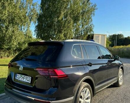 Чорний Фольксваген Тігуан, об'ємом двигуна 2 л та пробігом 223 тис. км за 27799 $, фото 2 на Automoto.ua