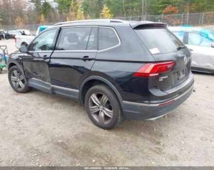 Черный Фольксваген Тигуан, объемом двигателя 2 л и пробегом 42 тыс. км за 14000 $, фото 2 на Automoto.ua