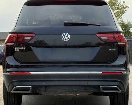 Чорний Фольксваген Тігуан, об'ємом двигуна 2 л та пробігом 34 тис. км за 11300 $, фото 4 на Automoto.ua