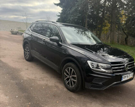 Чорний Фольксваген Тігуан, об'ємом двигуна 2 л та пробігом 159 тис. км за 19000 $, фото 2 на Automoto.ua