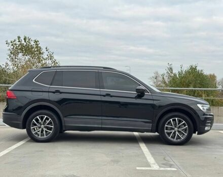 Чорний Фольксваген Тігуан, об'ємом двигуна 2 л та пробігом 117 тис. км за 19650 $, фото 3 на Automoto.ua