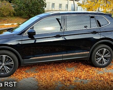 Черный Фольксваген Тигуан, объемом двигателя 2 л и пробегом 314 тыс. км за 15200 $, фото 1 на Automoto.ua