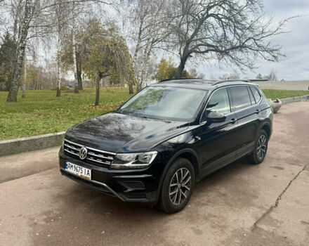Чорний Фольксваген Тігуан, об'ємом двигуна 2 л та пробігом 159 тис. км за 19000 $, фото 1 на Automoto.ua