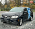 Черный Фольксваген Тигуан, объемом двигателя 2 л и пробегом 160 тыс. км за 12000 $, фото 1 на Automoto.ua