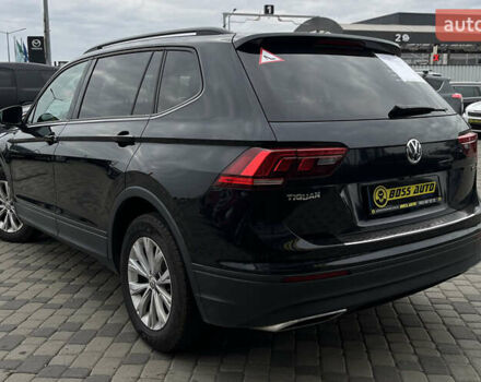 Черный Фольксваген Тигуан, объемом двигателя 1.98 л и пробегом 272 тыс. км за 16200 $, фото 4 на Automoto.ua