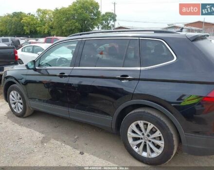 Чорний Фольксваген Тігуан, об'ємом двигуна 2 л та пробігом 187 тис. км за 16000 $, фото 4 на Automoto.ua