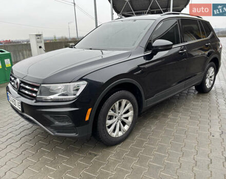 Чорний Фольксваген Тігуан, об'ємом двигуна 1.98 л та пробігом 175 тис. км за 14750 $, фото 2 на Automoto.ua