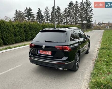 Чорний Фольксваген Тігуан, об'ємом двигуна 2 л та пробігом 124 тис. км за 19500 $, фото 78 на Automoto.ua