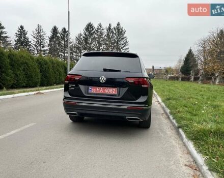 Чорний Фольксваген Тігуан, об'ємом двигуна 2 л та пробігом 124 тис. км за 19500 $, фото 107 на Automoto.ua