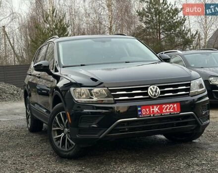 Чорний Фольксваген Тігуан, об'ємом двигуна 2 л та пробігом 200 тис. км за 15900 $, фото 1 на Automoto.ua