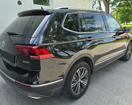 Чорний Фольксваген Тігуан, об'ємом двигуна 2 л та пробігом 41 тис. км за 13200 $, фото 4 на Automoto.ua