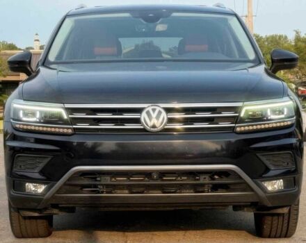 Черный Фольксваген Тигуан, объемом двигателя 2 л и пробегом 33 тыс. км за 8800 $, фото 1 на Automoto.ua