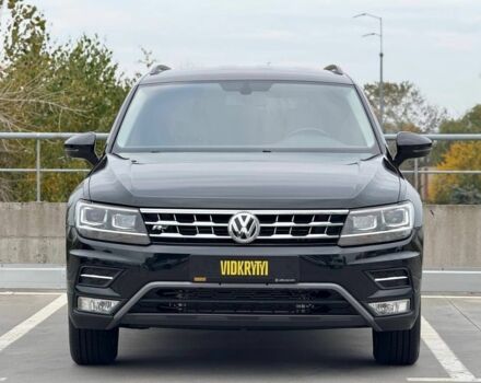 Чорний Фольксваген Тігуан, об'ємом двигуна 2 л та пробігом 117 тис. км за 19650 $, фото 1 на Automoto.ua