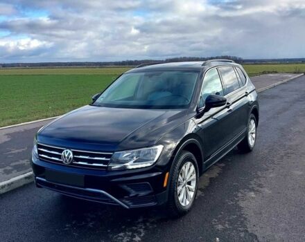 Черный Фольксваген Тигуан, объемом двигателя 2 л и пробегом 76 тыс. км за 9300 $, фото 1 на Automoto.ua