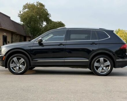 Чорний Фольксваген Тігуан, об'ємом двигуна 2 л та пробігом 34 тис. км за 11300 $, фото 2 на Automoto.ua