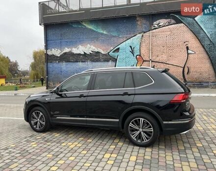 Чорний Фольксваген Тігуан, об'ємом двигуна 2 л та пробігом 124 тис. км за 19500 $, фото 4 на Automoto.ua