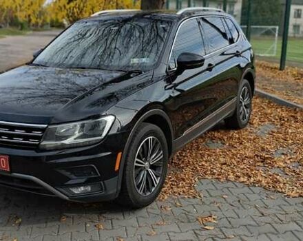 Чорний Фольксваген Тігуан, об'ємом двигуна 1.98 л та пробігом 314 тис. км за 15200 $, фото 1 на Automoto.ua