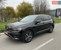 Чорний Фольксваген Тігуан, об'ємом двигуна 2 л та пробігом 124 тис. км за 19500 $, фото 68 на Automoto.ua
