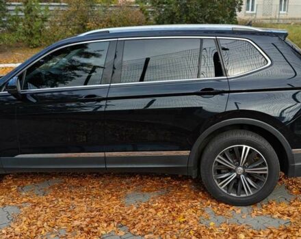 Черный Фольксваген Тигуан, объемом двигателя 2 л и пробегом 314 тыс. км за 14700 $, фото 2 на Automoto.ua