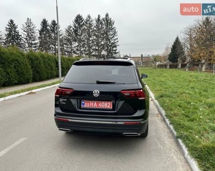 Чорний Фольксваген Тігуан, об'ємом двигуна 2 л та пробігом 124 тис. км за 19500 $, фото 76 на Automoto.ua