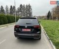 Чорний Фольксваген Тігуан, об'ємом двигуна 2 л та пробігом 124 тис. км за 19500 $, фото 76 на Automoto.ua