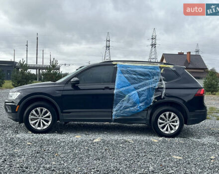 Черный Фольксваген Тигуан, объемом двигателя 2 л и пробегом 160 тыс. км за 12000 $, фото 2 на Automoto.ua