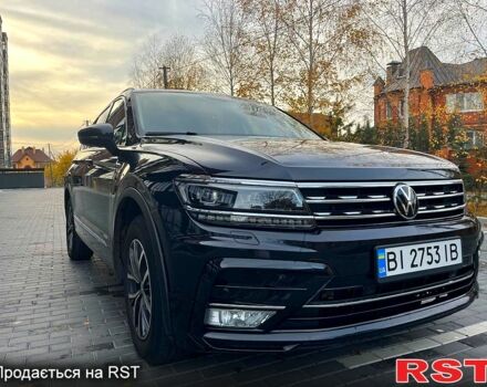 Черный Фольксваген Тигуан, объемом двигателя 2 л и пробегом 133 тыс. км за 22000 $, фото 2 на Automoto.ua