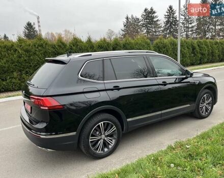 Чорний Фольксваген Тігуан, об'ємом двигуна 2 л та пробігом 124 тис. км за 19500 $, фото 82 на Automoto.ua