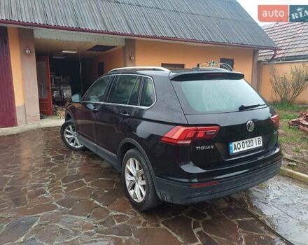 Чорний Фольксваген Тігуан, об'ємом двигуна 1.97 л та пробігом 220 тис. км за 23500 $, фото 1 на Automoto.ua