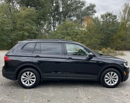 Черный Фольксваген Тигуан, объемом двигателя 2 л и пробегом 129 тыс. км за 19000 $, фото 2 на Automoto.ua