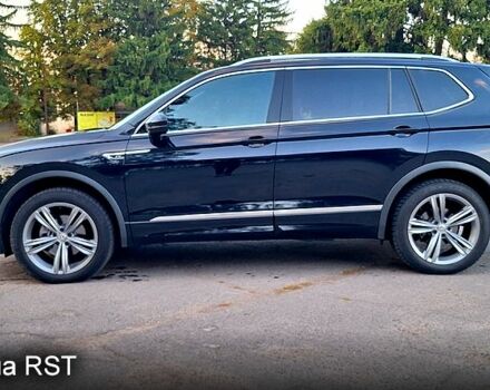 Чорний Фольксваген Тігуан, об'ємом двигуна 2 л та пробігом 237 тис. км за 27900 $, фото 2 на Automoto.ua