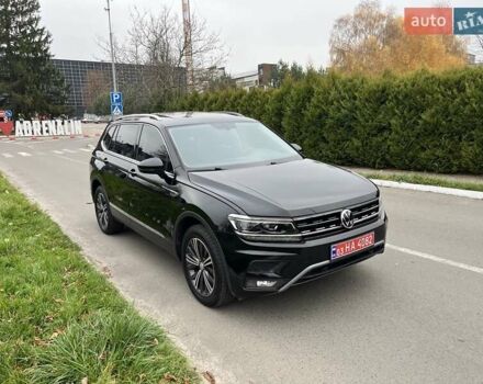 Чорний Фольксваген Тігуан, об'ємом двигуна 2 л та пробігом 124 тис. км за 19500 $, фото 90 на Automoto.ua