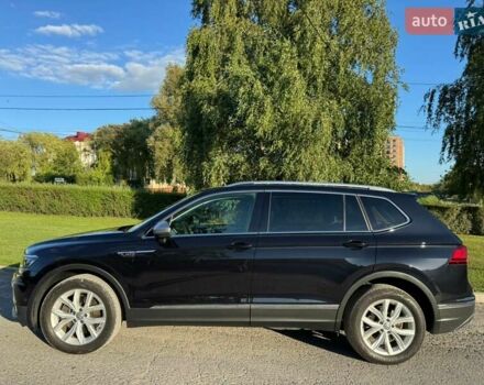 Чорний Фольксваген Тігуан, об'ємом двигуна 2 л та пробігом 223 тис. км за 27799 $, фото 1 на Automoto.ua