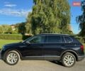 Чорний Фольксваген Тігуан, об'ємом двигуна 2 л та пробігом 223 тис. км за 27799 $, фото 1 на Automoto.ua