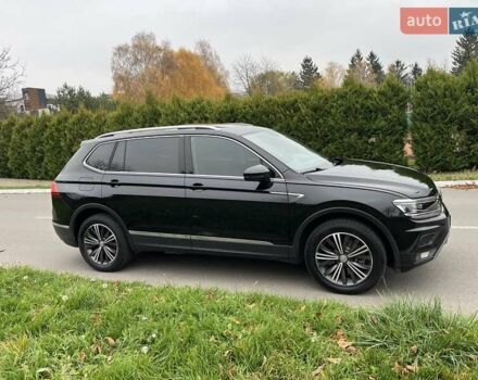 Чорний Фольксваген Тігуан, об'ємом двигуна 2 л та пробігом 124 тис. км за 19500 $, фото 91 на Automoto.ua