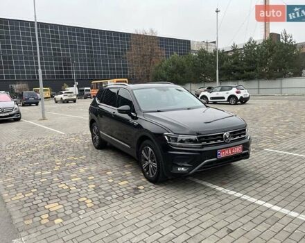 Чорний Фольксваген Тігуан, об'ємом двигуна 2 л та пробігом 124 тис. км за 19500 $, фото 22 на Automoto.ua