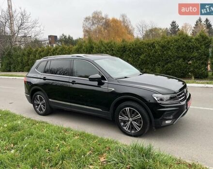 Чорний Фольксваген Тігуан, об'ємом двигуна 2 л та пробігом 124 тис. км за 19500 $, фото 89 на Automoto.ua
