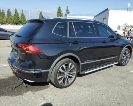 Чорний Фольксваген Тігуан, об'ємом двигуна 2 л та пробігом 65 тис. км за 6800 $, фото 2 на Automoto.ua
