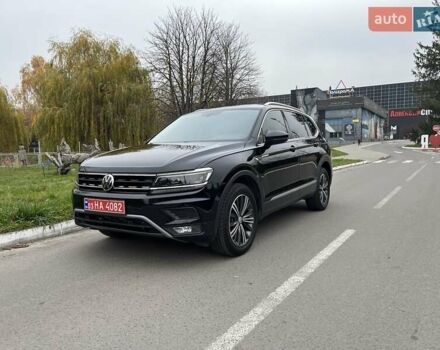 Чорний Фольксваген Тігуан, об'ємом двигуна 2 л та пробігом 124 тис. км за 19500 $, фото 94 на Automoto.ua