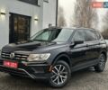 Чорний Фольксваген Тігуан, об'ємом двигуна 2 л та пробігом 200 тис. км за 15900 $, фото 1 на Automoto.ua