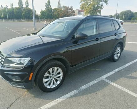 Чорний Фольксваген Тігуан, об'ємом двигуна 2 л та пробігом 130 тис. км за 16500 $, фото 1 на Automoto.ua