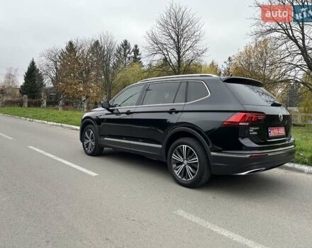 Чорний Фольксваген Тігуан, об'ємом двигуна 2 л та пробігом 124 тис. км за 19500 $, фото 103 на Automoto.ua