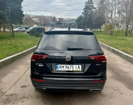 Чорний Фольксваген Тігуан, об'ємом двигуна 2 л та пробігом 159 тис. км за 19000 $, фото 4 на Automoto.ua