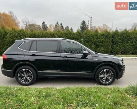 Чорний Фольксваген Тігуан, об'ємом двигуна 2 л та пробігом 124 тис. км за 19500 $, фото 86 на Automoto.ua
